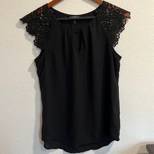 Black dressy top with crotchet sleeves